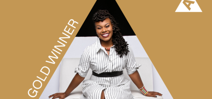 gold background with white letters that read 